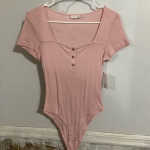 Brand new bodysuit